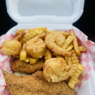 a basket of fried fish and chips