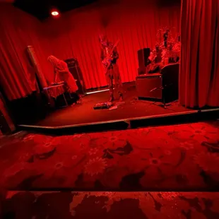 a stage with red lighting