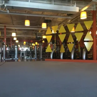 Sitting in the open area and looking at the machines