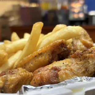 Lemon pepper, wings, and fries