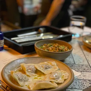 Boiled dumplings &amp; rice congee