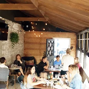 Covered patios with heaters and fans. Dog friendly!