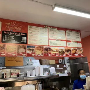 a woman behind the counter