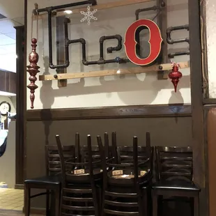 a table and chairs in a restaurant