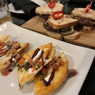 Duck quesadilla and steak sandwich