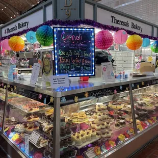 a display of cakes and pastries