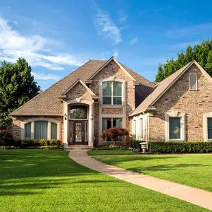 One of the many beautiful homes featuring our Single Hung, Double Hung and Picture Windows