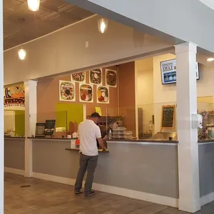 a man standing at the counter