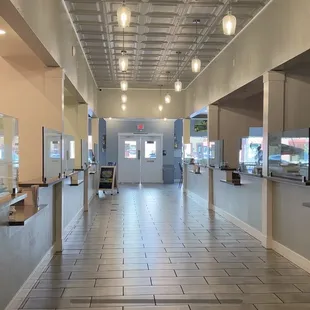 Hallway with multiple restaurants in marketplace