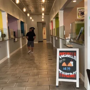 Entrance view of multiple restaurants in marketplace