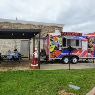 Located at gas station next to Wendy's