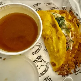 2 Quesabirria tacos with birria sauce