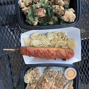 a hot dog and a side dish