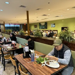 a man eating in a restaurant