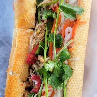 Vegan Special Combination Banh Mi (Dat Biet) w/ bbq chicken, tuna &amp; shredded meat. Mix &amp; match 3 different types of meat or go w/ default.