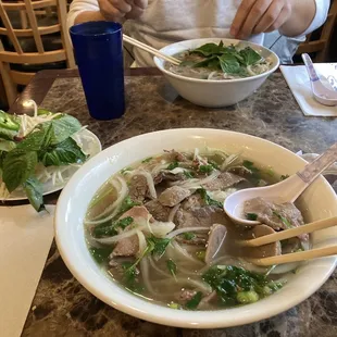 Pho w rare steak, brisket, and meatballs