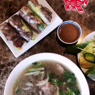 Grilled pork spring rolls and Large Pho Tai (rare beef steak)