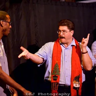 John Mustache delivers a zinger in style from the 100th show