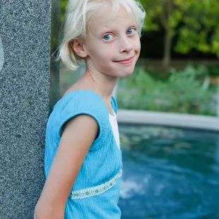 I love how Chris captured her so perfectly in this shot.  I sense this blondie is going 2 b a handful in the next few years. :-)