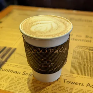 a cup of coffee on a table