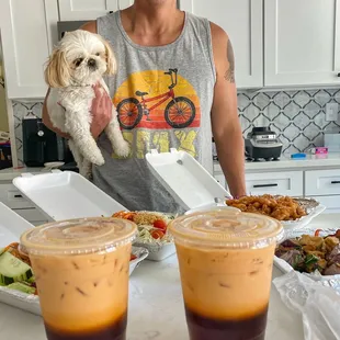 a man holding a dog