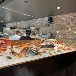 Seafood counter greeting you as you walk inside