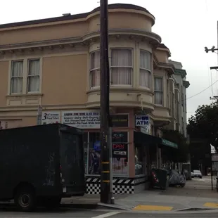 a truck parked in front of a building