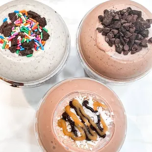 three desserts with chocolate and sprinkles