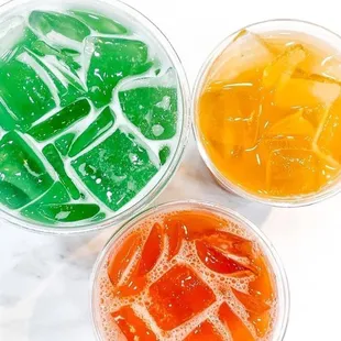 three bowls of fruit juice