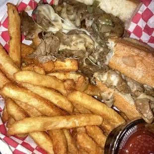 Philly cheese stake with fries