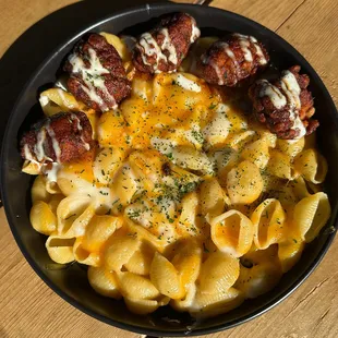 Boneless Wings &amp; Mac Bowl
Made with House Beer Cheese. Wings Tossed in Your Choice of BBQ or Nashville Buffalo Sauce