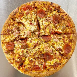 Meat Lovers Pizza
Pizza Sauce | Mozzarella Cheese | Bacon | Ham | Pepperoni | Sliced Italian Sausage