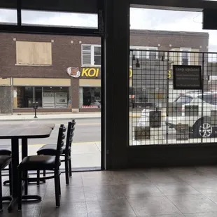a view of a street through a window