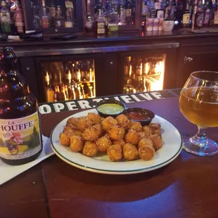 Stop by to feel a little normal...sweet potatoe tots and la Chouffe are the best!