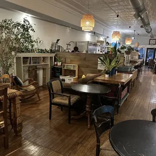 tables, chairs, and a fireplace