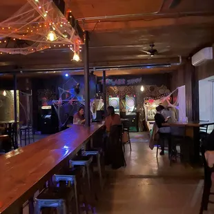 a long bar with stools