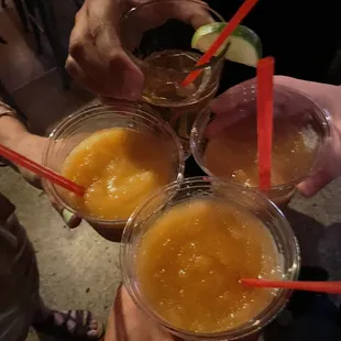 four glasses of orange juice