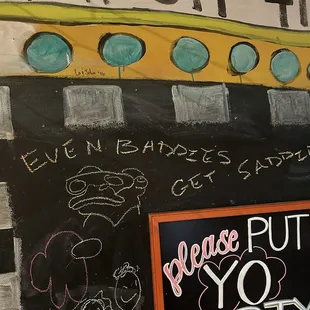 a chalkboard with a message