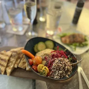 Amazing Hummus salad and I added a blackened fish