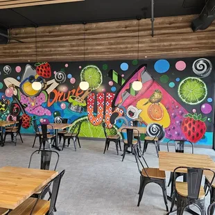 a colorful mural on the wall