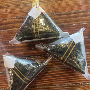 Spam, shrimp tempura, and yoshi (seaweed and crab) onigiri.