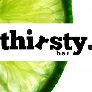 a lime slice with the word thirsty