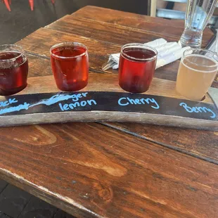 Flight of kombucha and cider yum