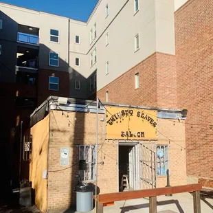 the entrance to a brick building