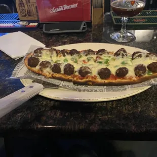 Belgian meatball, red sauce green pepper pizza