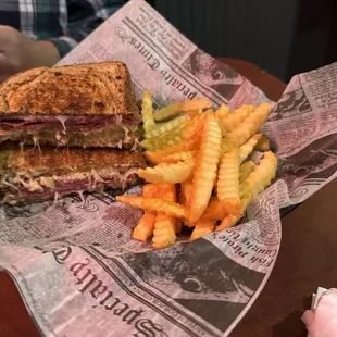 Reuben sandwich with local sauerkraut and piping hot French fries.