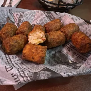 Keggers - Large tater tots stuffed with cheese, bacon, and chives.  Served piping hot!