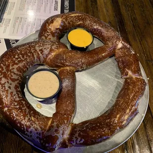 Giant pretzel with cheese and mustard