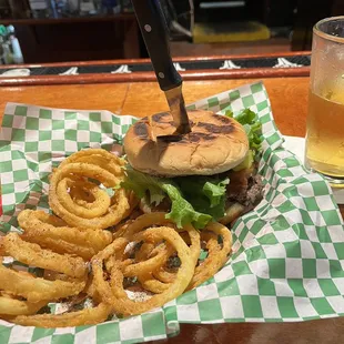Bacon cheeseburger with onion rings.