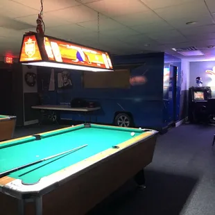 a pool table in a game room